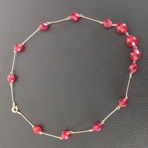 Vintage 12 karat gold filled necklace with vibrant ruby red crystals